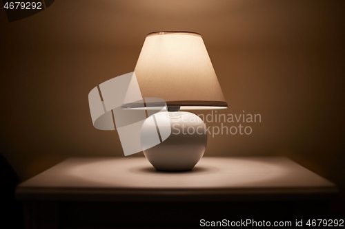 Image of Lamp on a nightstand
