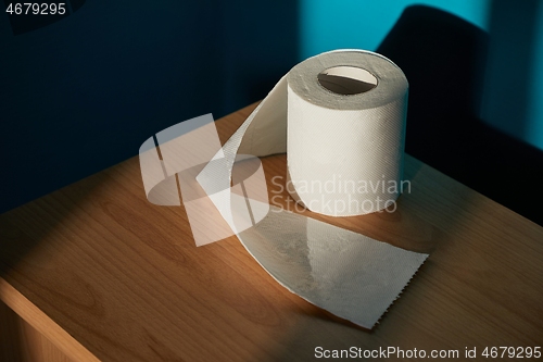 Image of Toilet paper on shelf un sunlight