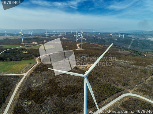 Image of Windmills or wind turbine on wind farm