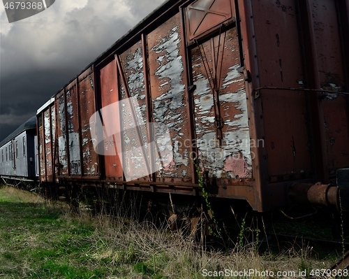 Image of old shabby railroad cars 