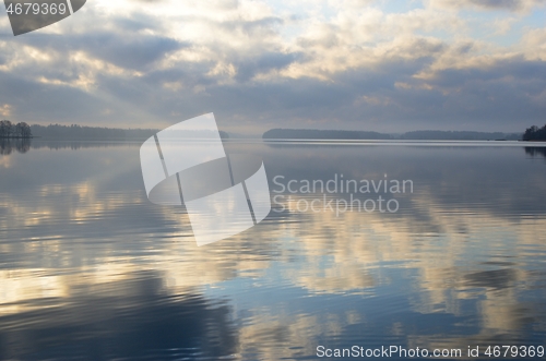 Image of reflection of the sky on the surface of the lake, Finland
