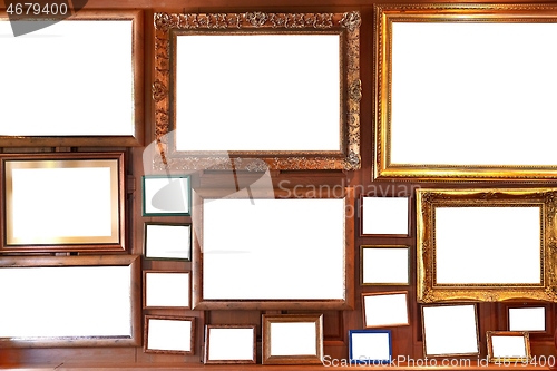 Image of Blank picture frames on a wall gallery