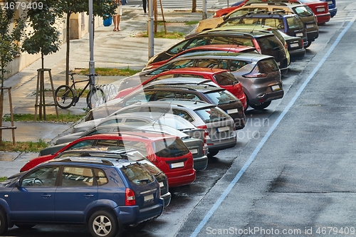 Image of Cars parked ion a street