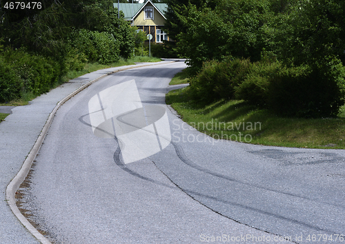 Image of black marks of braking a car