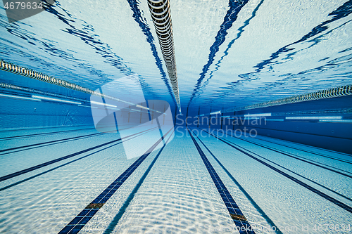 Image of Olympic Swimming pool under water background.