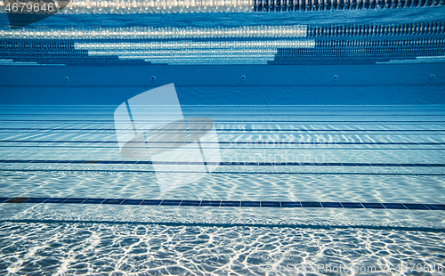 Image of Olympic Swimming pool under water background.