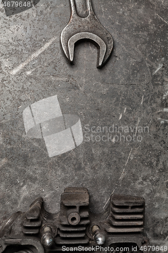 Image of Old tools set on a vintage metallic background with space for text