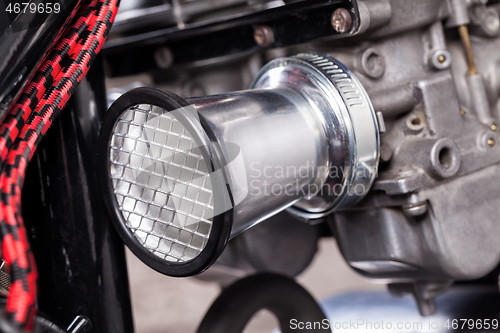 Image of Custom bobber motorbike in an workshop garage.