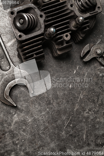Image of Old tools set on a vintage metallic background with space for text