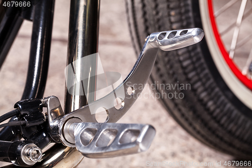 Image of Custom bobber motorbike in an workshop garage.