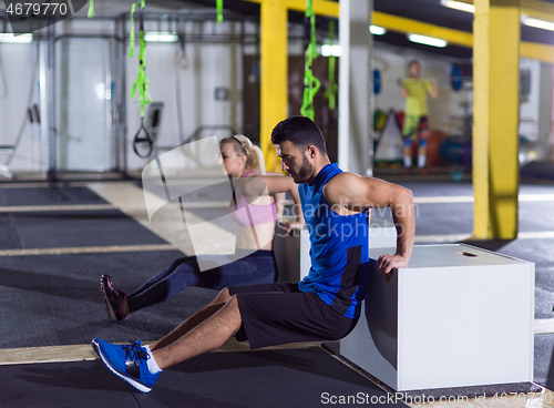 Image of athletes working out their arms