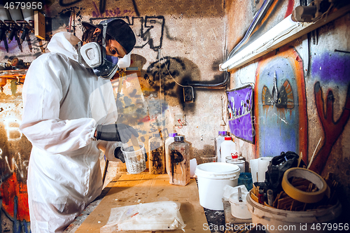 Image of Master painter in a factory