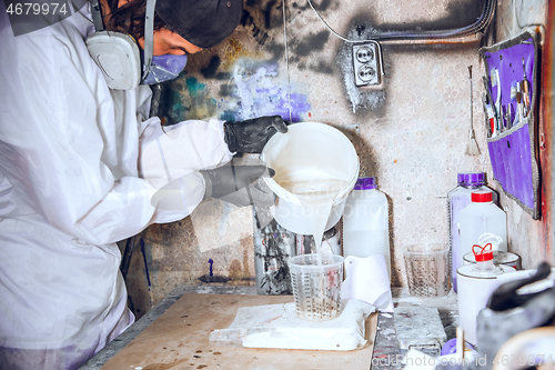 Image of Master painter in a factory