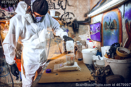 Image of Master painter in a factory