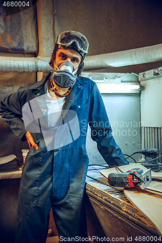 Image of Portrait of serious professional carpenter