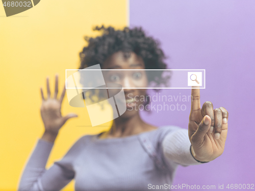 Image of Woman\'s hand with finger on blue background