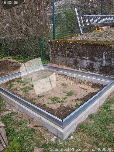 Image of Concrete foundation for a greenhouse