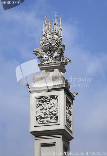 Image of Decorative detail on a column in a Vietnamese temple