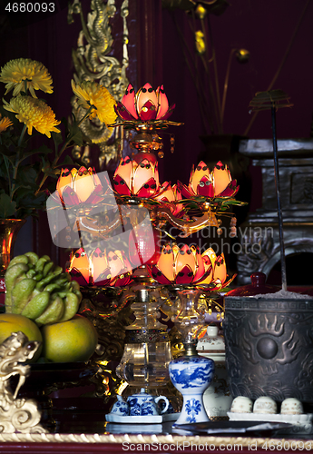 Image of Gild lamp in a buddhist Temple, Vietnam