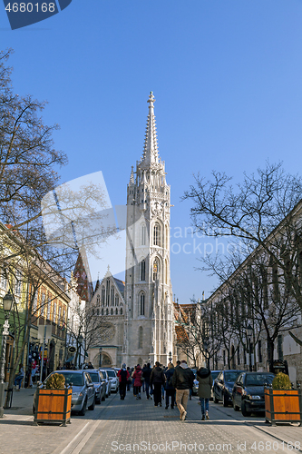 Image of Budapest, HUNGARY - FEBRUARY 15, 2015 - Street with tower of St. Matthias Church in Budapest