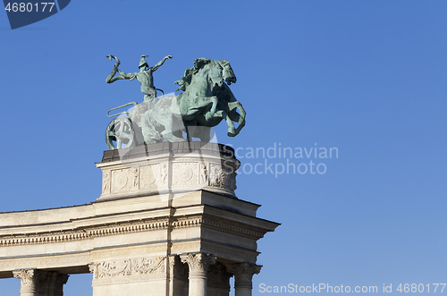 Image of Statue of a man on a chariot, symbol of war, on a colonnade in Heroes Square, Budapest