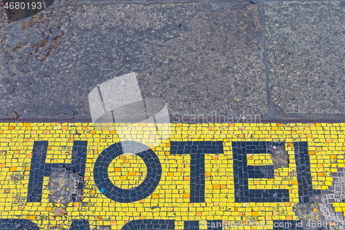 Image of Damaged Hotel Sign