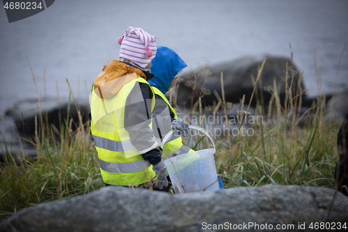 Image of Picking up Plastic Waste