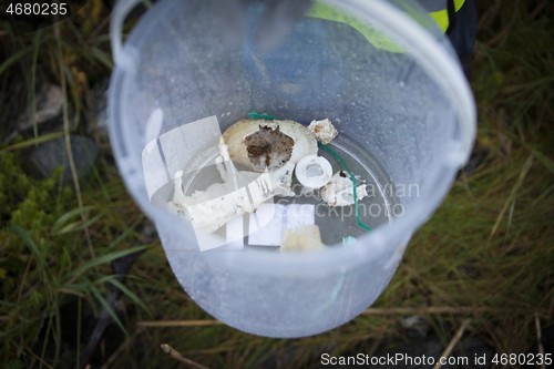 Image of Picking up Plastic Waste