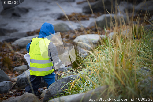 Image of Picking up Plastic Waste