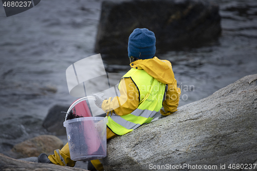 Image of Picking up Plastic Waste