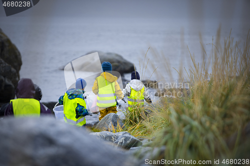 Image of Picking up Plastic Waste