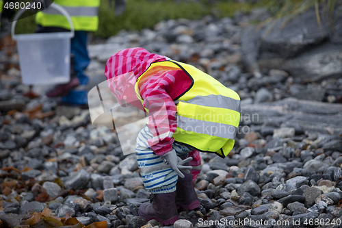 Image of Picking up Plastic Waste