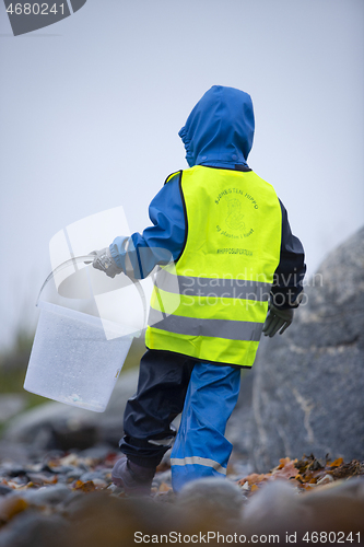 Image of Picking up Plastic Waste