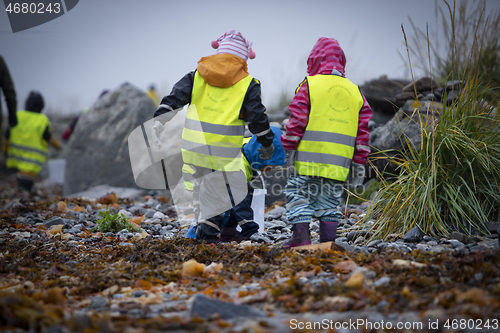 Image of Picking up Plastic Waste