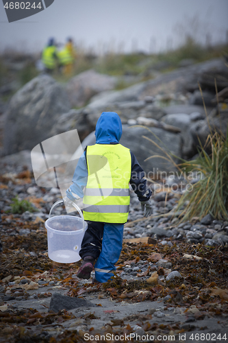 Image of Picking up Plastic Waste