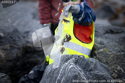 Image of Picking up Plastic Waste