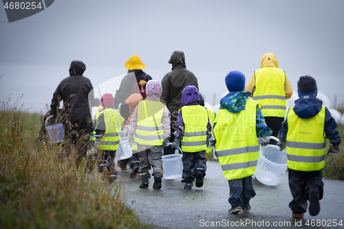 Image of Picking up Plastic Waste