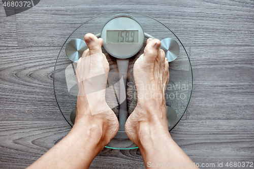 Image of Human feet on electronic scales