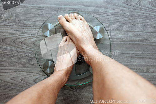 Image of Human feet on electronic scales