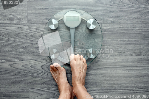 Image of Human feet on electronic scales