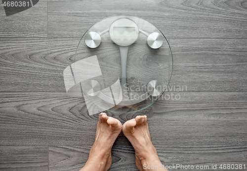 Image of Human feet on electronic scales