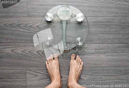 Image of Human feet on electronic scales