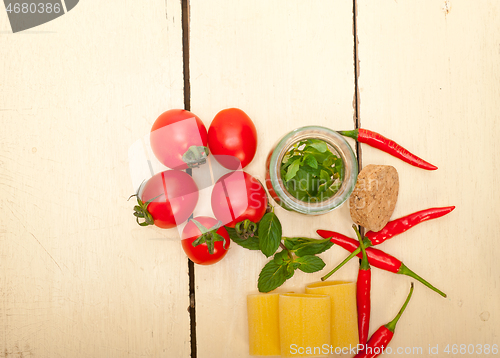 Image of Italian pasta paccheri with tomato mint and chili pepper