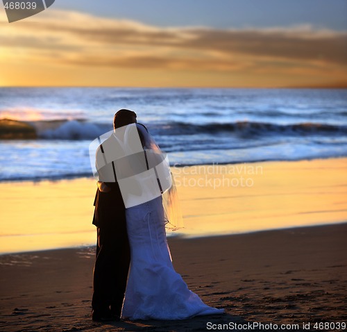 Image of Couple wedding at sunset