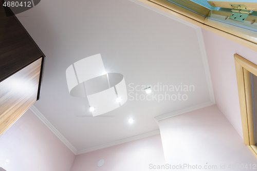 Image of Stretch matte white ceiling in the interior of the corridor in the apartment