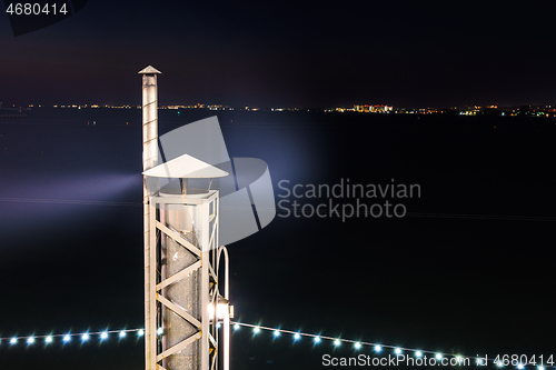 Image of Smoke coming from the chimney, long exposure at night