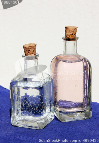 Image of Two Small Bottles