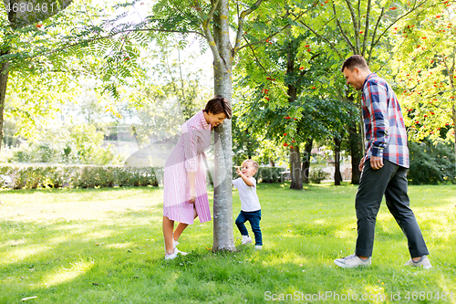 Image of happy family having fun at summer park