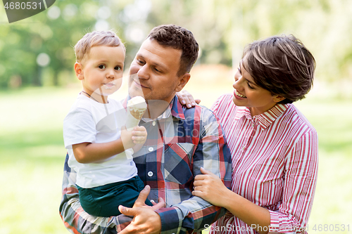 Image of happy family at summer park