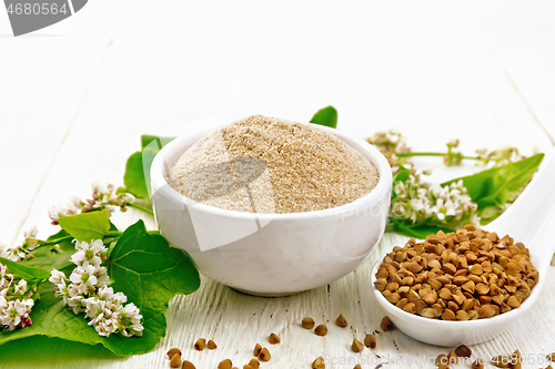 Image of Flour buckwheat brown in bowl on light board